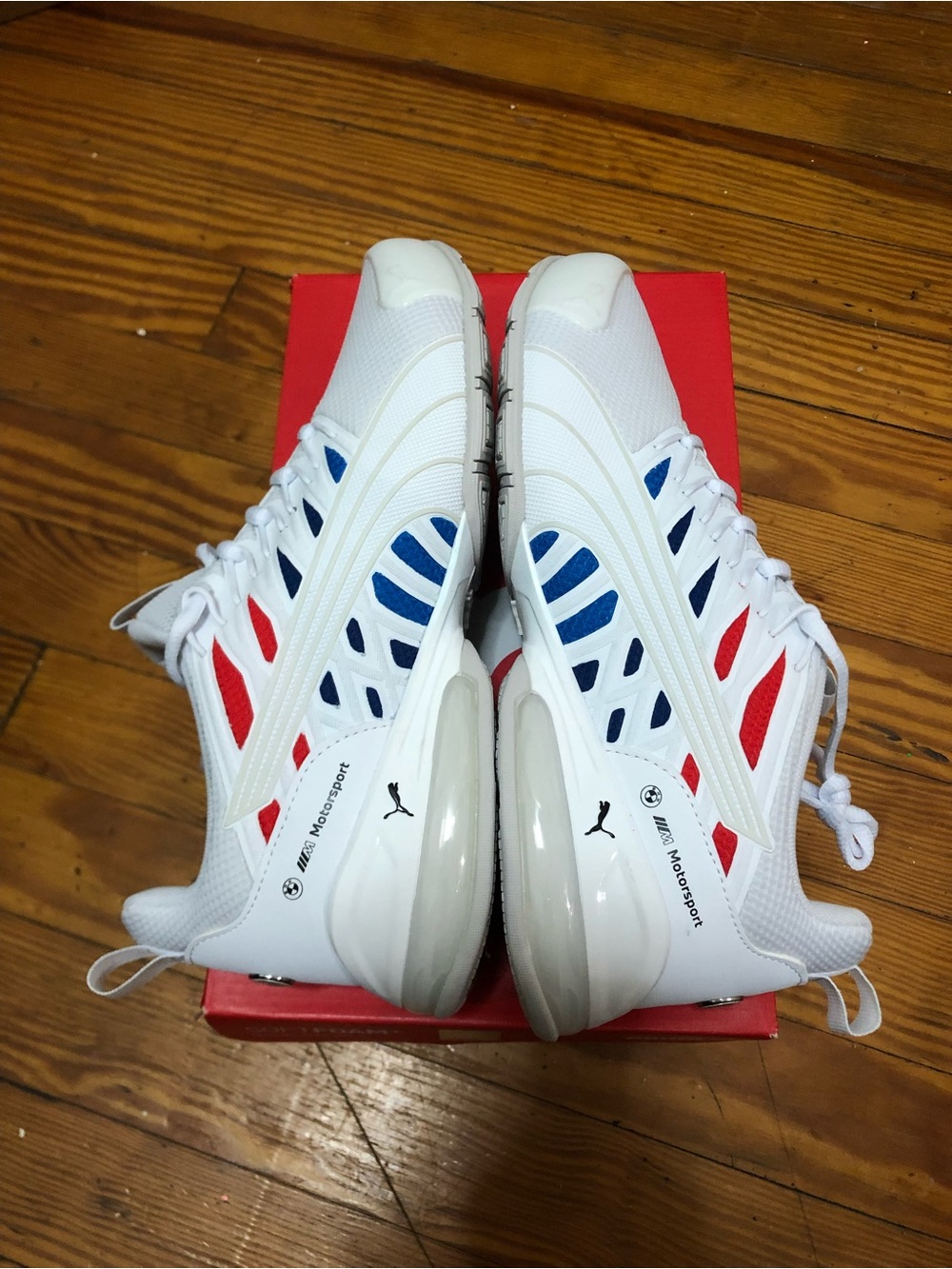 Puma White Sneakers with Red and Blue Accents